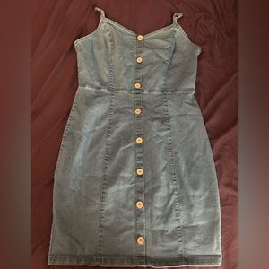 Denim mini dress with adjustable straps and button details